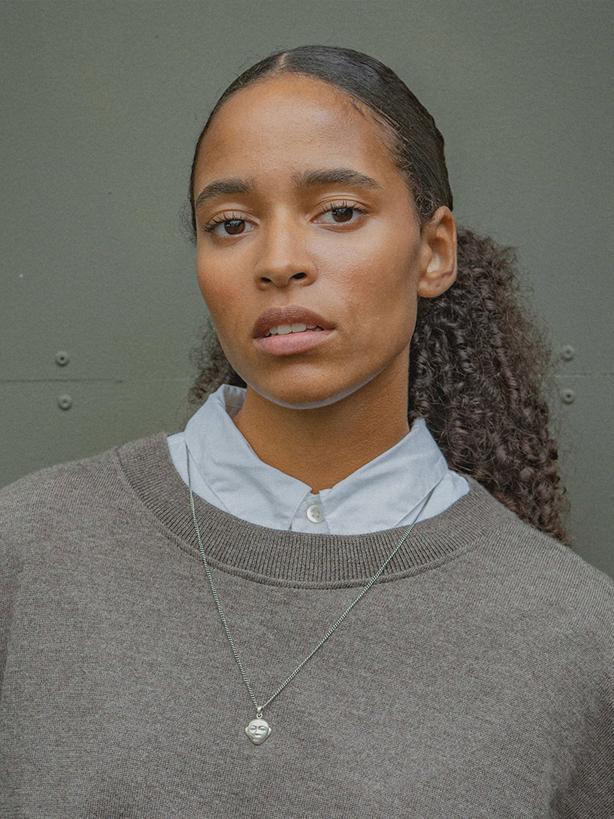 SDN X OMEN OMEN Face Pendant Necklace am model
