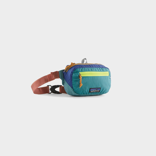 Patagonia Ultralight Black Hole Mini Hip Pack in Farbe patchwork_subtidal_blue